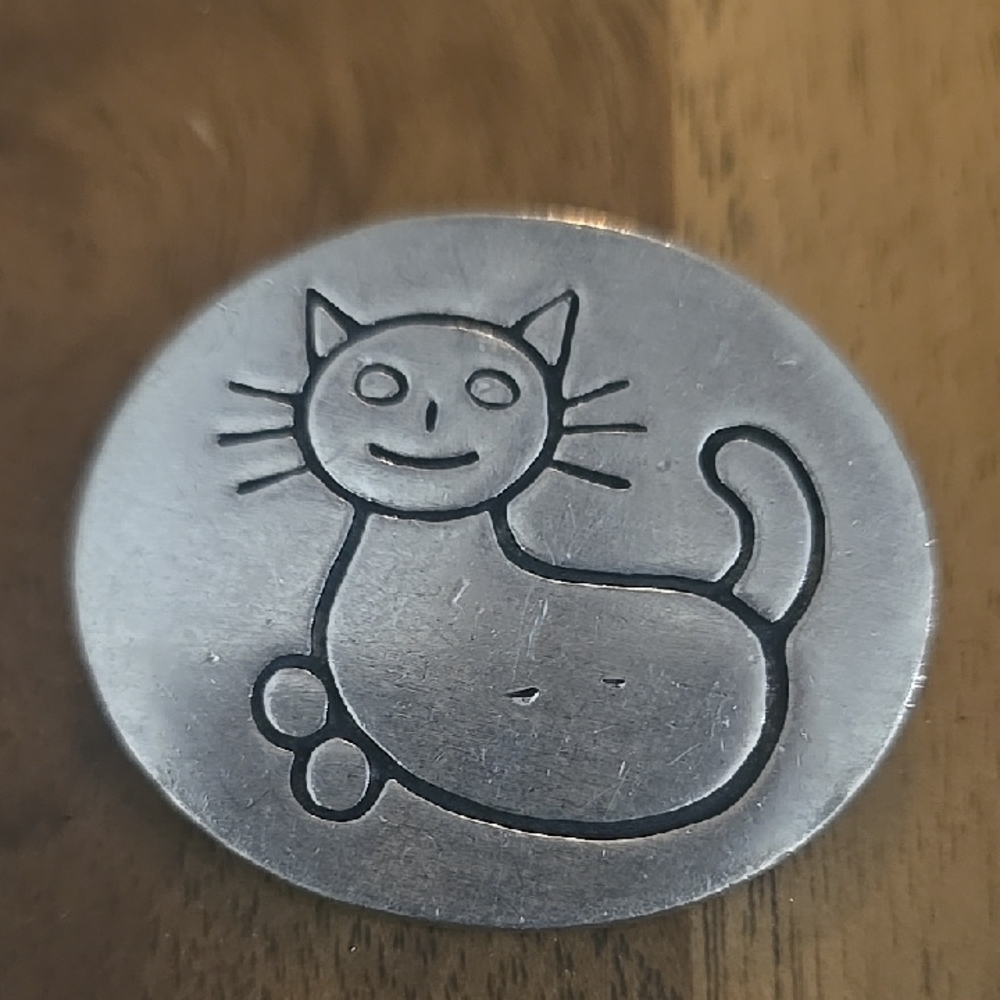 1990 Brooch signed